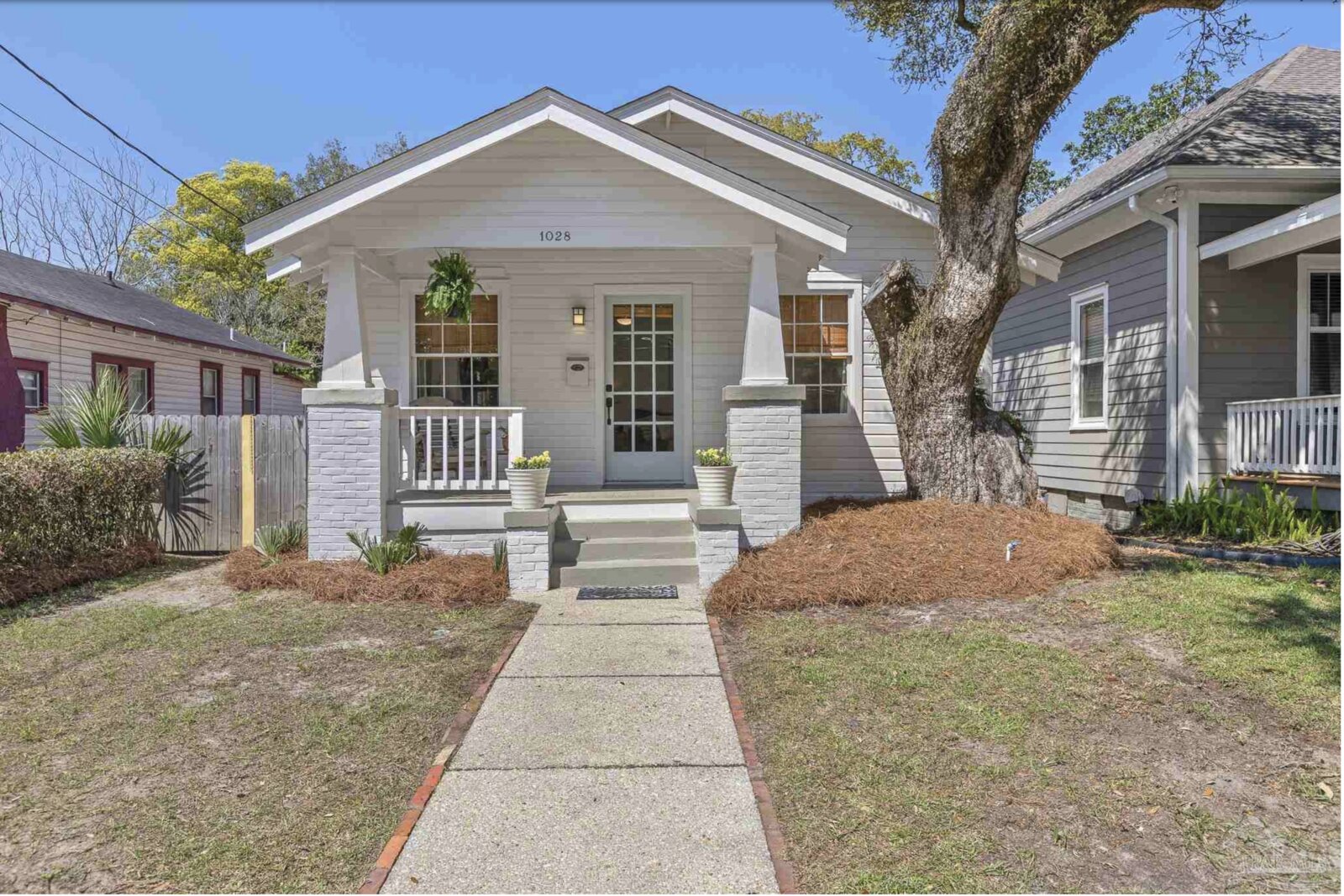 Candy's Cottage — a charming white craftsman bungalow in East Hill, Pensacola