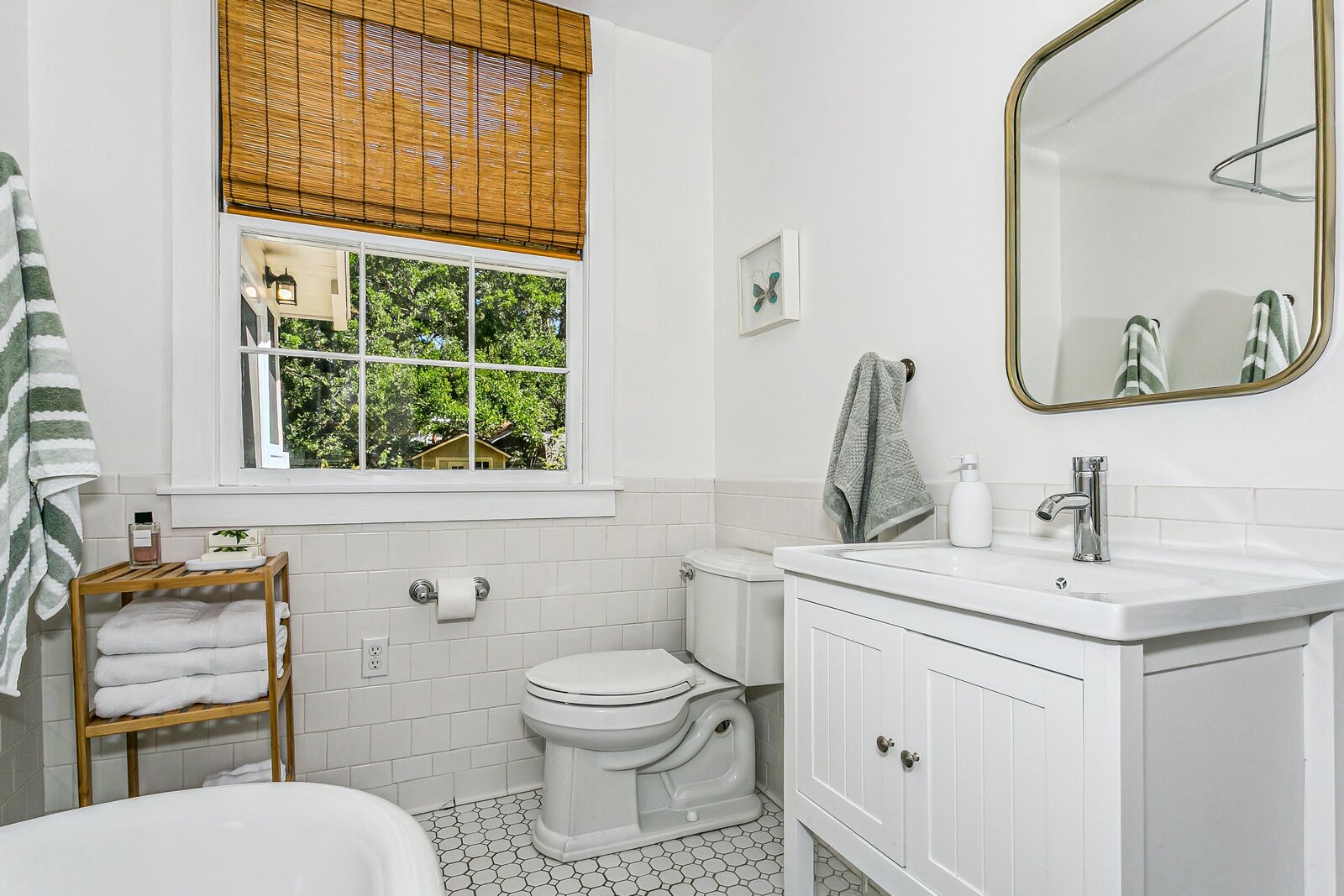 Bright bathroom with subway tile and modern fixtures
